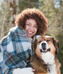 Happy Woman and Dog -  Gum Grafting - The Fort Collins Dentist