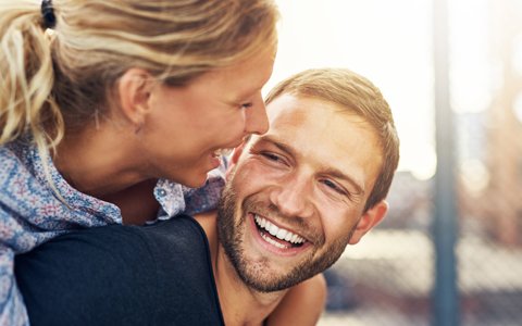 Couple Laughing with Healthy Gums - The Fort Collins Dentist