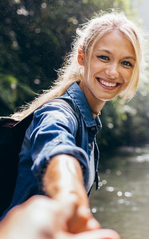 Woman Hiking After Tooth Extraction - The Fort Collins Dentist